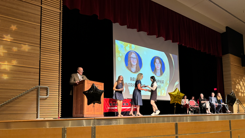 Students on a stage