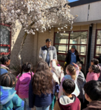 Students outside working on garden