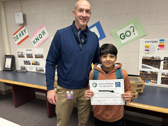 AP and 4th grader with award