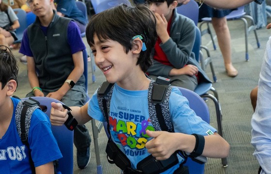 Canterbury Woods ES deaf and hard of hearing students enjoying music through vibration vests 