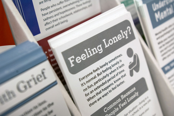 photo of cards for mental health resources: text 'Feeling Lonely'