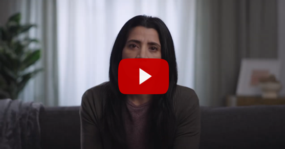 Parent sitting in a room and YouTube start arrow