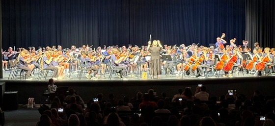 strings students on stage at Oakton High School
