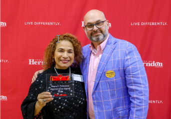 Fanny Salazar-Laske and Mayor Keven with Distinguished Service Award