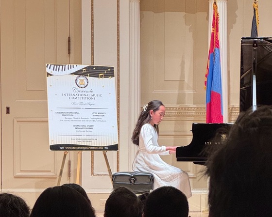 student playing piano