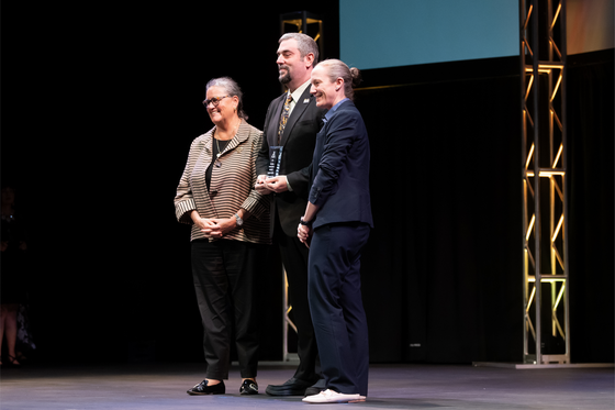 Mr. LaBrie on stage with Dr. Reid at the FCPS Honors ceremony