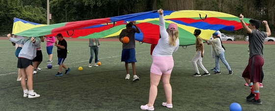 students with parachute