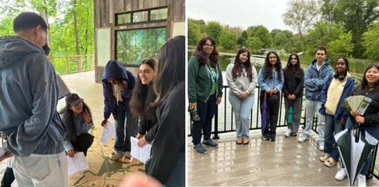 Students standing together smiling and students looking at map together