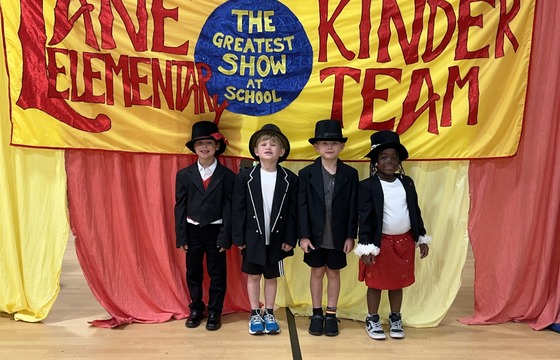 Students dressed as ringmasters in the Kindergarten Circus