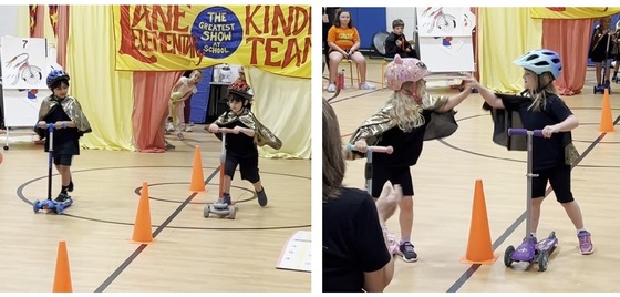 Students dressed as bikers performing in the Kindergarten Circus