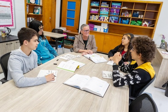 Dr. Reid speaks with students