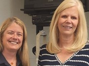teacher with award
