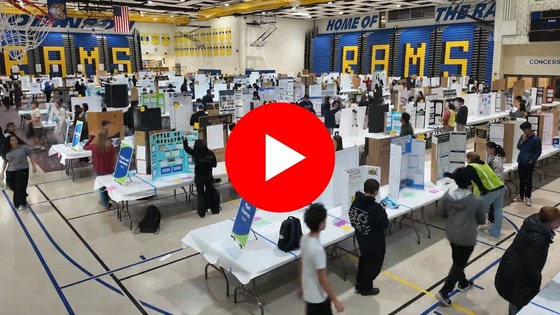 Overhead view of FCPS science fair with youtube play button