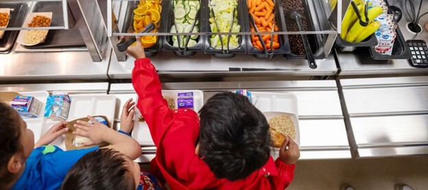Students in a cafeteria line