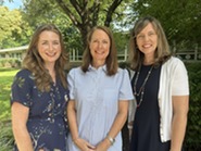 Mrs. Kaplan, Mrs. Lin, and Mrs. Burke standing outside.