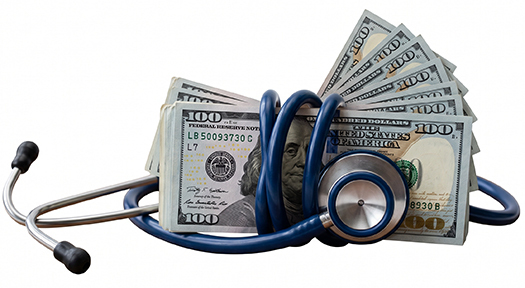 Stethoscope wrapped around $700 bills 