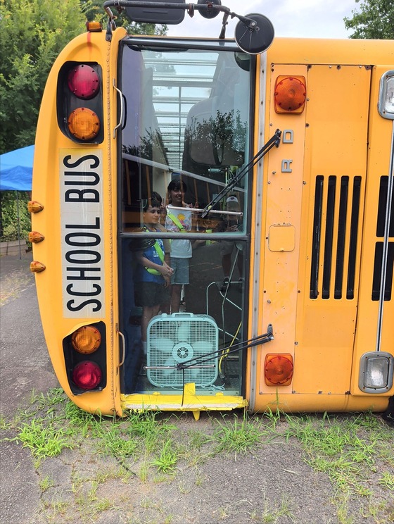 students on a bus practicing safety skills