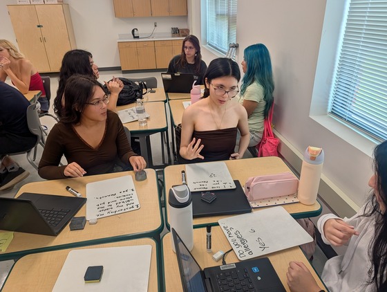 Students practice communication skills using their knowledge of ASL 