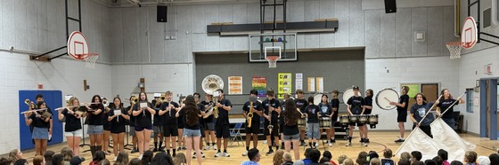 An assembly showcasing Marshall HS's band ensemble to Stenwood students