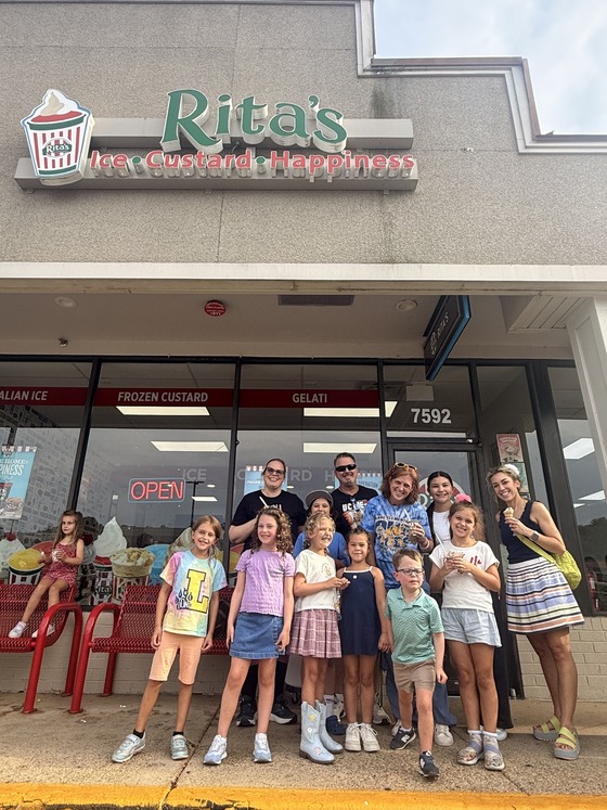 Families gathered outside of Rita's Ice at PTA Restaurant Night