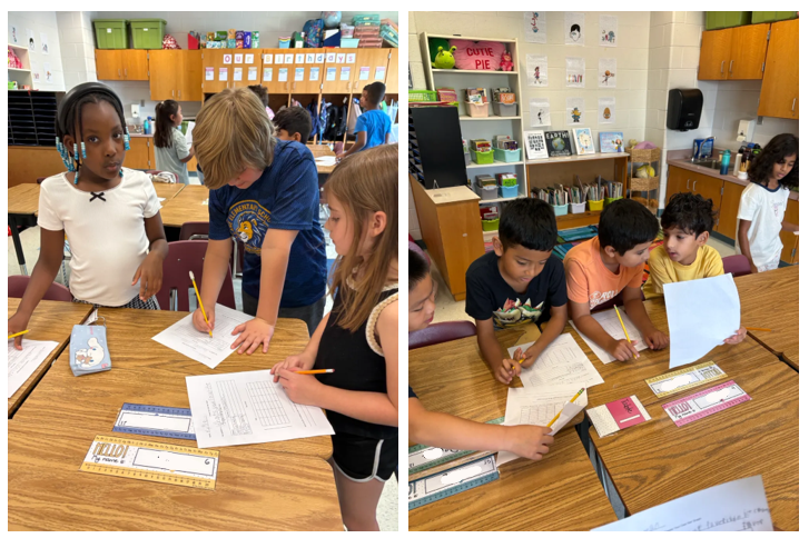 3rd grade students filling out surveys together to capture data for a graph