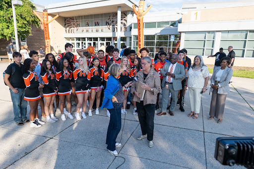 Dr. Reid being interviewed at Hayfield Secondary School on the first day of the new school year