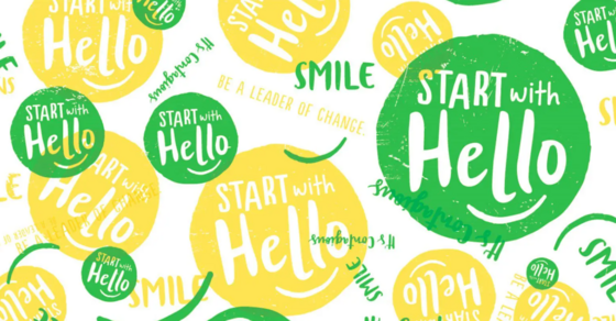 start with hello week graphic with green and yellow text and smiley faces