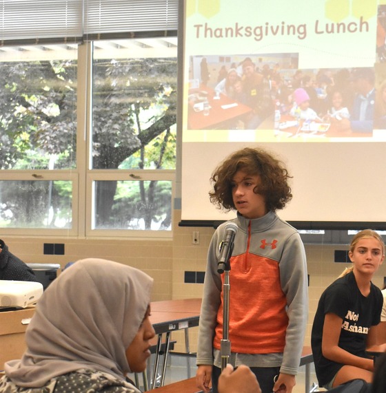 A student presenting at the New Student Orientation