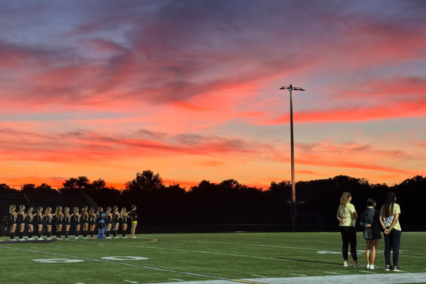field hockey team and sunset