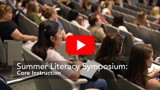 Teacher attending the FCPS Summer Learning Symposium with a YouTube play button overlay