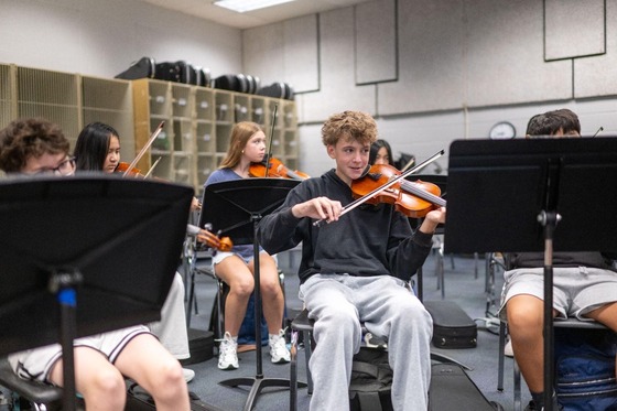 student in strings class