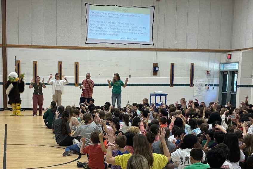Students at the schoolwide morning meeting