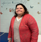 Woman standing in a red sweater