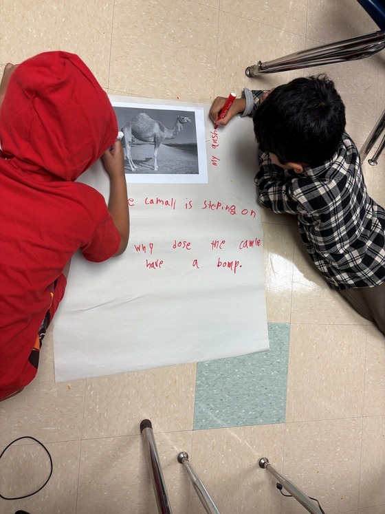 students completing a chalk talk