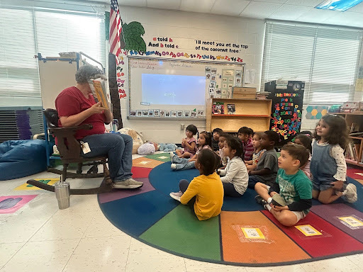 Ms. McHugh’s Pre-K students are enjoying a read-aloud of “There’s a Bird on Your Head!” by ReaMo Willems. 