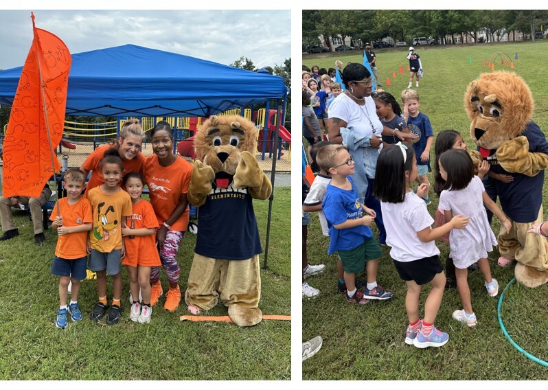 Students wearing orange with an orange flag with Lane mascot Mr. Paws and students greeting Mr Paws