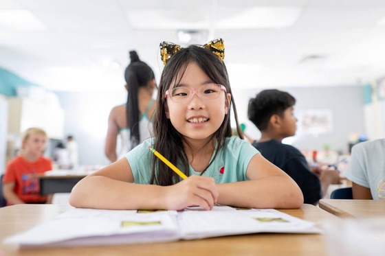student smiles for a photo