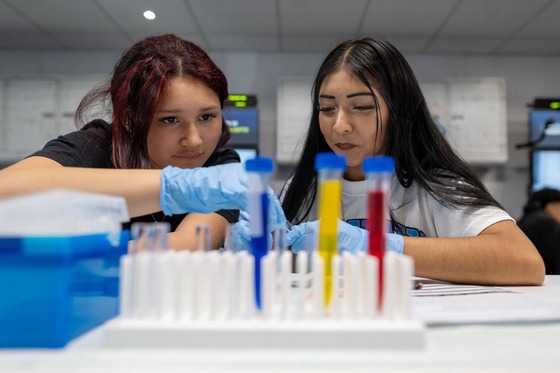 students doing a science experiment