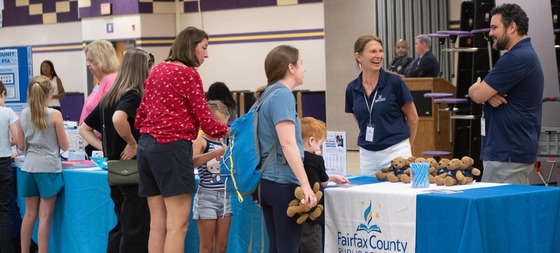 FCPS information table at BBQ for Military families at Lake Braddock Secondary