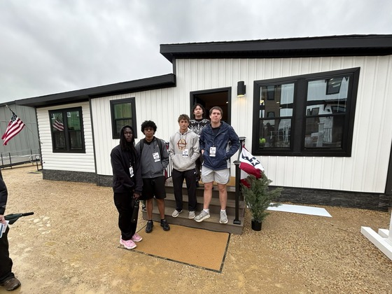 Carpentry students on the HUD field trip