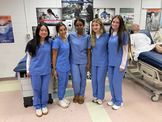 Medical Assistant students in their scrubs