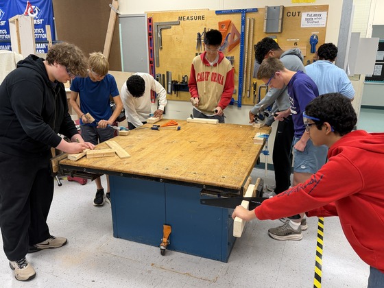 STEM engineering students trying out hand tools