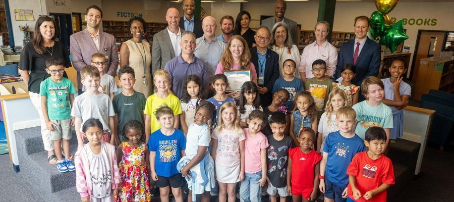 FCPS Cares Renee Octaviano with second grade class and FCPS leadership