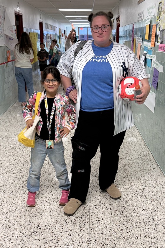 Student dressed as a teacher and teacher dressed as a student