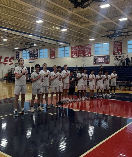 Boys standing on the basketball court