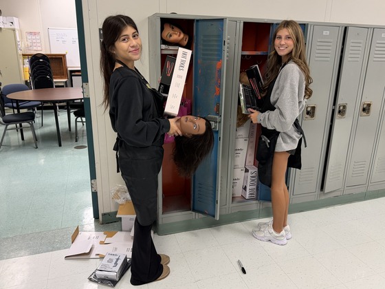 Cosmetology students organizing their lockers