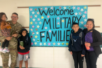 Military family visiting pancake breakfast