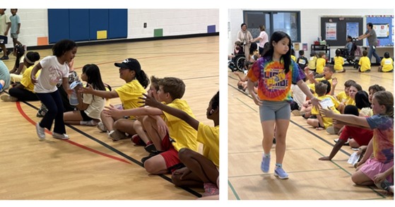 Students cheering on students with multiple abilities running in the gym