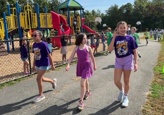 Girls running in the Fun Run