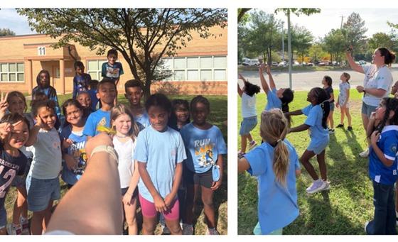 2nd graders watching their teachers release the monarch butterflies from their classroom into the school garden